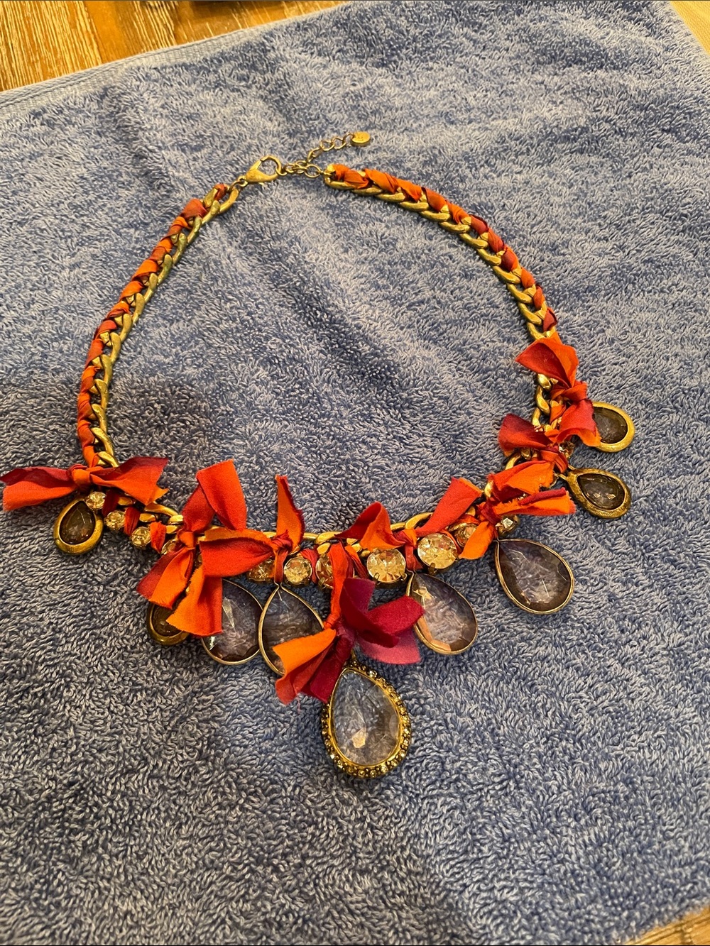 LOFT Statement Rust/Burgundy Ribbon Teardrop Necklace w/antique gold finish.